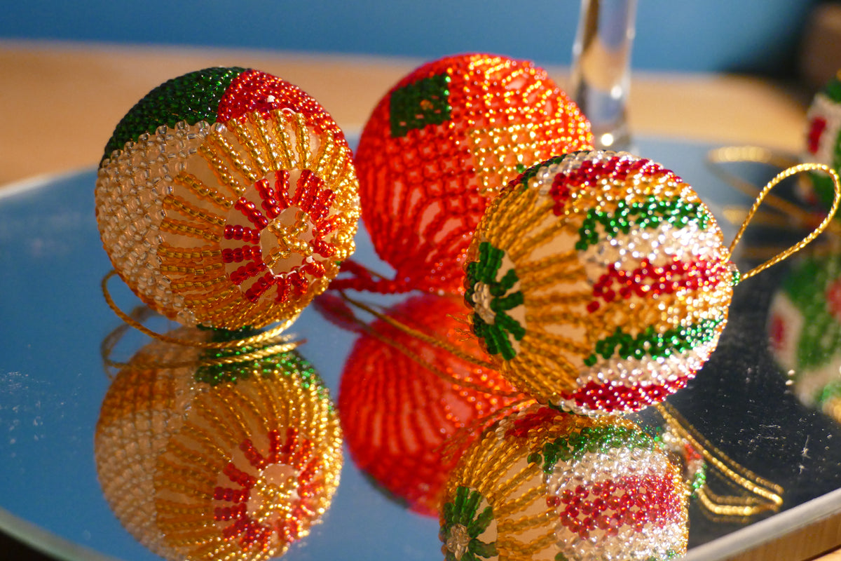 Jubilee Sparkle handmade beaded Christmas baubles in red, green, gold and white